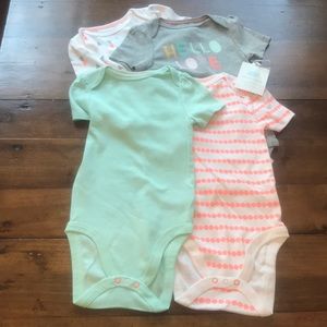NWT 4 piece short sleeve bodysuits